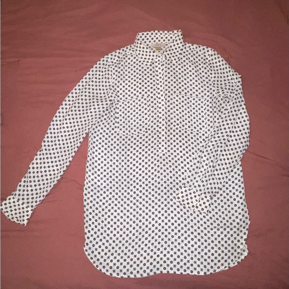 White floral pattern button up blouse.